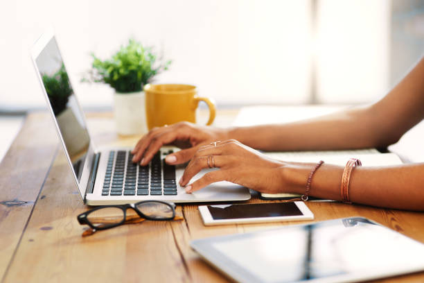 woman on computer in her home at desk